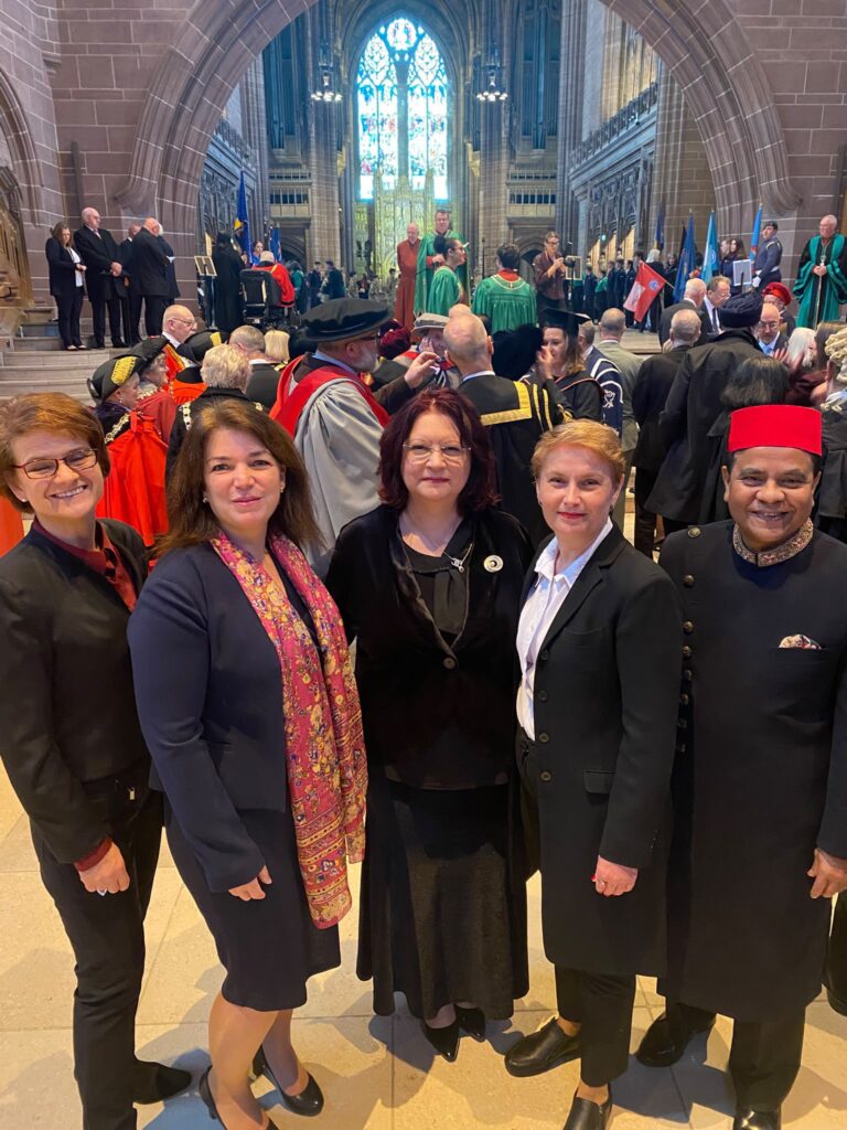 Dina Railean, Honorary Consul of the Republic of Moldova in Manchester, stands with fellow consular representatives inside Liverpool Cathedral following the Service to Mark the Beginning of the Legal Year on 11 October 2026. Civic, judicial, academic and diplomatic guests in ceremonial dress gather behind them beneath the cathedral’s stone arches and stained-glass window.